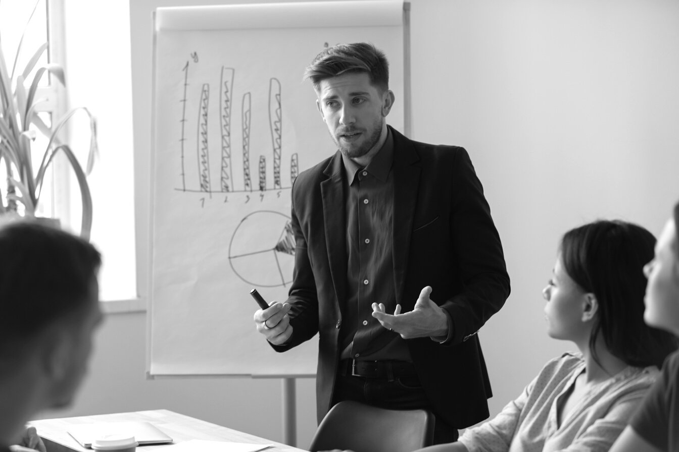Man Talking with Colleagues